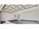 Spacious and clean garage with a neutral painted floor and modern door at 168 Cotillion Cres, Summerville, SC 29483