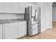 Modern kitchen with stainless steel refrigerator and granite countertops at 168 Cotillion Cres, Summerville, SC 29483