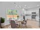Cozy breakfast nook adjacent to a stylish kitchen with stainless steel appliances and granite countertops at 168 Cotillion Cres, Summerville, SC 29483