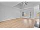 Open living room with fireplace and backyard access at 168 Cotillion Cres, Summerville, SC 29483