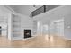 Bright open-concept living room with fireplace and tall ceilings at 168 Cotillion Cres, Summerville, SC 29483