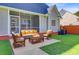 Enjoy outdoor living on the patio with a cozy seating area and inviting fire pit at 168 Cotillion Cres, Summerville, SC 29483