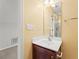 Bathroom with a single sink vanity, a large mirror, and a shower in the background at 1708 Waterbrook Dr, Charleston, SC 29414