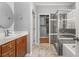 Bathroom featuring vanity, glass shower, and closet at 1708 Waterbrook Dr, Charleston, SC 29414