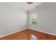 Bright bedroom with hardwood floors and large window providing ample natural light at 1708 Waterbrook Dr, Charleston, SC 29414