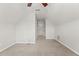 Bonus room with neutral carpeting, ceiling fan, and access to another room at 1708 Waterbrook Dr, Charleston, SC 29414