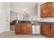 Open kitchen with granite counters, stainless steel appliances, and tile floors at 1708 Waterbrook Dr, Charleston, SC 29414