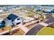 Aerial view of a charming community farm, outdoor seating area, and residential homes in a picturesque setting at 172 Helena Park Dr, Summerville, SC 29486
