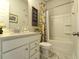 Bright bathroom with a modern vanity, a tub with a decorative shower curtain and marble floor at 172 Helena Park Dr, Summerville, SC 29486