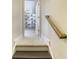 Hallway leading to a storage room, showcasing neutral walls and carpeted floors at 172 Helena Park Dr, Summerville, SC 29486