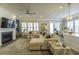 Spacious living room with fireplace, ample seating and lots of natural light at 172 Helena Park Dr, Summerville, SC 29486