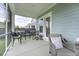 Covered porch with a table and chairs at 172 Helena Park Dr, Summerville, SC 29486