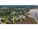 A gorgeous aerial view of waterfront homes, beautiful marshland and mature trees at 1721 Bowline Dr, Mount Pleasant, SC 29466