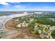 Aerial view of a waterfront neighborhood, beautiful homes, docks, and green landscaping at 1721 Bowline Dr, Mount Pleasant, SC 29466
