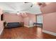 Bonus room with wood floors, pitched ceilings, and neutral pink-colored walls at 1721 Bowline Dr, Mount Pleasant, SC 29466