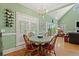 Breakfast nook with natural light, window shutters, and wine rack at 1721 Bowline Dr, Mount Pleasant, SC 29466