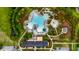 Overhead view of a community pool and clubhouse with palm trees and seating at 1721 Bowline Dr, Mount Pleasant, SC 29466