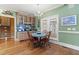 Cozy dining area featuring hardwood floors and a built in wet bar and cabinetry at 1721 Bowline Dr, Mount Pleasant, SC 29466