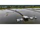 An aerial view of a community dock with boat slips, boat house and boardwalk at 1721 Bowline Dr, Mount Pleasant, SC 29466