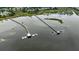An aerial view of two community boat docks with multiple boat slips along the marsh at 1721 Bowline Dr, Mount Pleasant, SC 29466