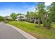 Charming home situated on a well-manicured lawn with mature trees and shrubbery at 1721 Bowline Dr, Mount Pleasant, SC 29466