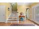 Welcoming foyer with hardwood floors, staircase, and ample natural light at 1721 Bowline Dr, Mount Pleasant, SC 29466