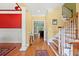 Elegant foyer with hardwood floors, staircase, and decorative molding at 1721 Bowline Dr, Mount Pleasant, SC 29466