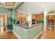 Well-lit kitchen with marble countertops, stainless steel appliances, and breakfast bar at 1721 Bowline Dr, Mount Pleasant, SC 29466