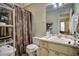 Bathroom featuring a shower and single sink vanity at 1830 Kempton Ave, James Island, SC 29412