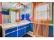 Bathroom with colorful walls, vibrant shower curtain, and good lighting at 1830 Kempton Ave, James Island, SC 29412