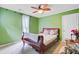 Bedroom with carpeted floors, ceiling fan, and natural light at 1830 Kempton Ave, James Island, SC 29412
