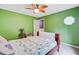 Bedroom featuring green walls, a ceiling fan, and carpeted floor at 1830 Kempton Ave, James Island, SC 29412