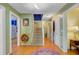 Spacious foyer with hardwood floors, staircase, and decorative rug, creating a welcoming entrance at 1830 Kempton Ave, James Island, SC 29412