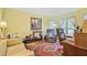 Comfortable living area featuring a cozy seating arrangement and bright, natural lighting at 1830 Kempton Ave, James Island, SC 29412