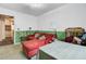 A living room features an orange sofa, lamps, and a table at 1830 Kempton Ave, James Island, SC 29412