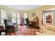 Sunlit home office area, featuring ample natural light, desk, and comfortable seating at 1830 Kempton Ave, James Island, SC 29412