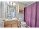 Bathroom featuring a vanity with a granite countertop and a shower with a purple curtain at 188 Midland Pkwy # 516, Summerville, SC 29485