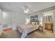 Comfortable bedroom features neutral carpet, fan, and a serene bath ensuite at 188 Midland Pkwy # 516, Summerville, SC 29485