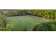 Aerial view of well-maintained sports fields featuring many soccer goals and manicured lawns at 1901 Bairds Cv, Charleston, SC 29414