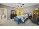 Comfortable bedroom with neutral tones, soft carpet, and modern furniture at 1901 Bairds Cv, Charleston, SC 29414