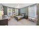 Inviting bedroom with neutral carpet, natural light, and ample space for playing at 1901 Bairds Cv, Charleston, SC 29414