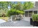 Outdoor deck with chairs and table perfect for outdoor seating at 197 High Grove Rd, Summerville, SC 29485