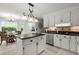 Spacious kitchen with white cabinets, granite countertops, stainless steel appliances, and eat-in dining area at 197 High Grove Rd, Summerville, SC 29485