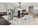 Modern kitchen featuring white cabinets, stainless steel appliances, granite countertops, and an island at 197 High Grove Rd, Summerville, SC 29485