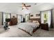 Spacious main bedroom featuring a king-size bed, dresser, and natural light from the windows at 197 High Grove Rd, Summerville, SC 29485