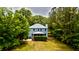 Aerial view of home featuring lush landscaping and spacious backyard at 1976 Liberia Rd, Wadmalaw Island, SC 29487