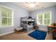 This bedroom provides a bunk bed, desk and a bright blue rug at 1976 Liberia Rd, Wadmalaw Island, SC 29487