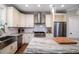 Kitchen island featuring granite countertops, stainless steel appliances, and modern cabinetry at 1976 Liberia Rd, Wadmalaw Island, SC 29487
