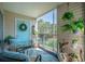 Relax on this lovely screened-in porch and enjoy the pleasant views from the unit at 2011 N Highway 17 # 2300F, Mount Pleasant, SC 29466