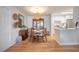 Cozy dining area with woven pendant light, hutch, and eat-in kitchen at 2011 N Highway 17 # 2300F, Mount Pleasant, SC 29466